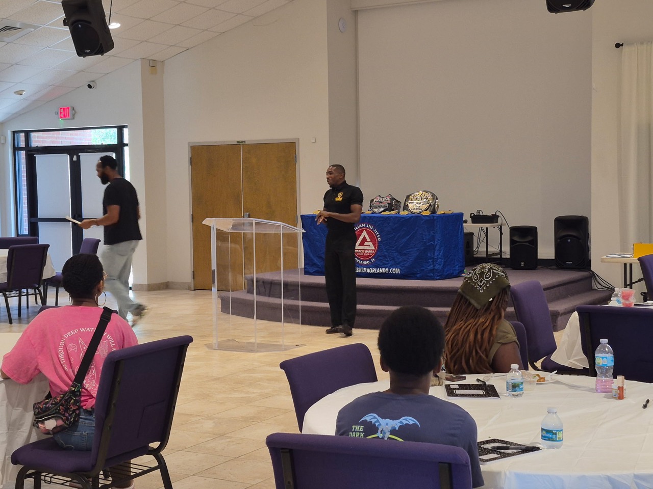 Jamisin Lacy speaking to young people in a live community presentation